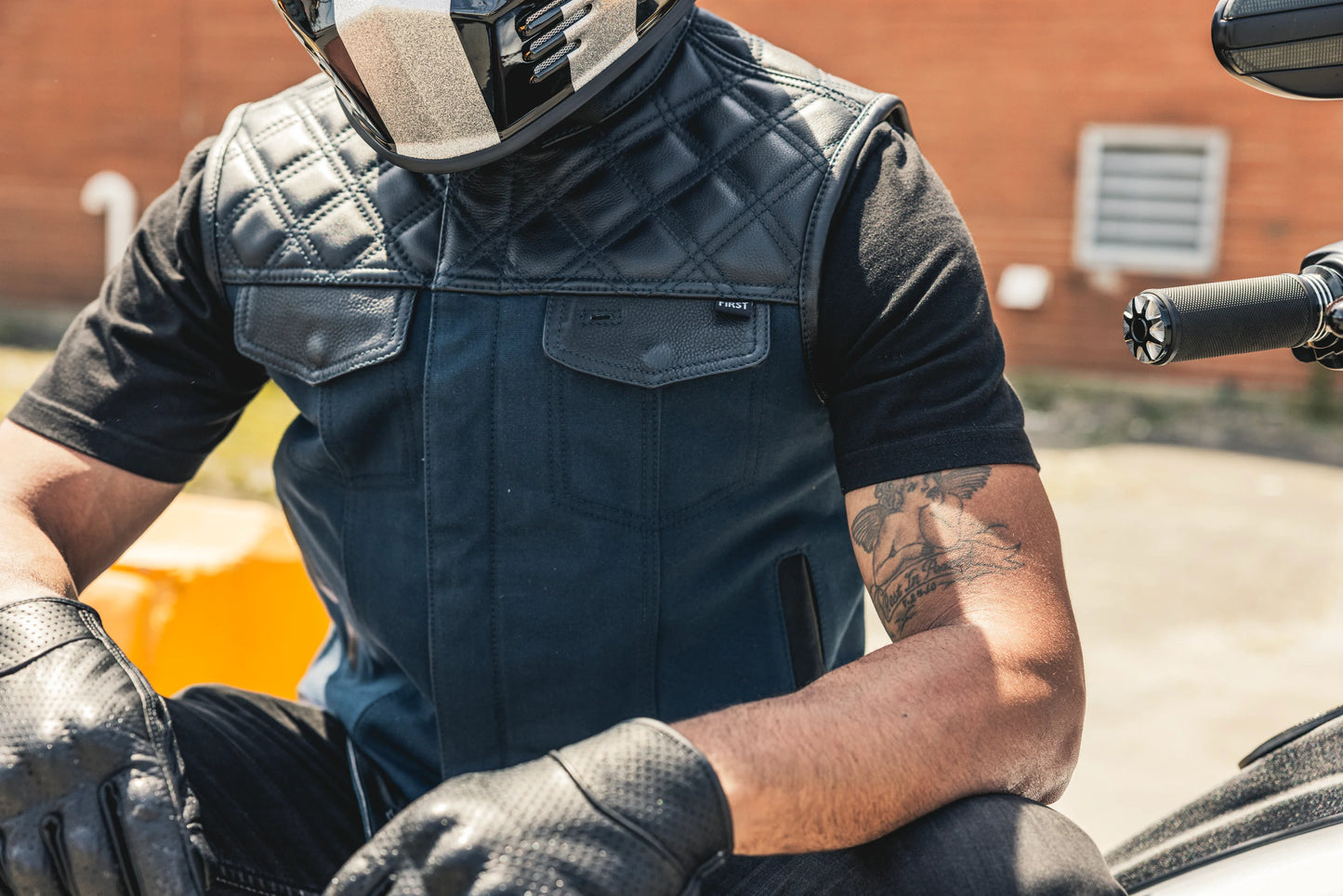 Close-Up: Motorcycle Rider in Stylish Club Vest, Concealed Carry.