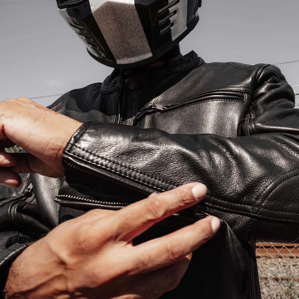 Man wearing Motorcycle Jacket and Helmet