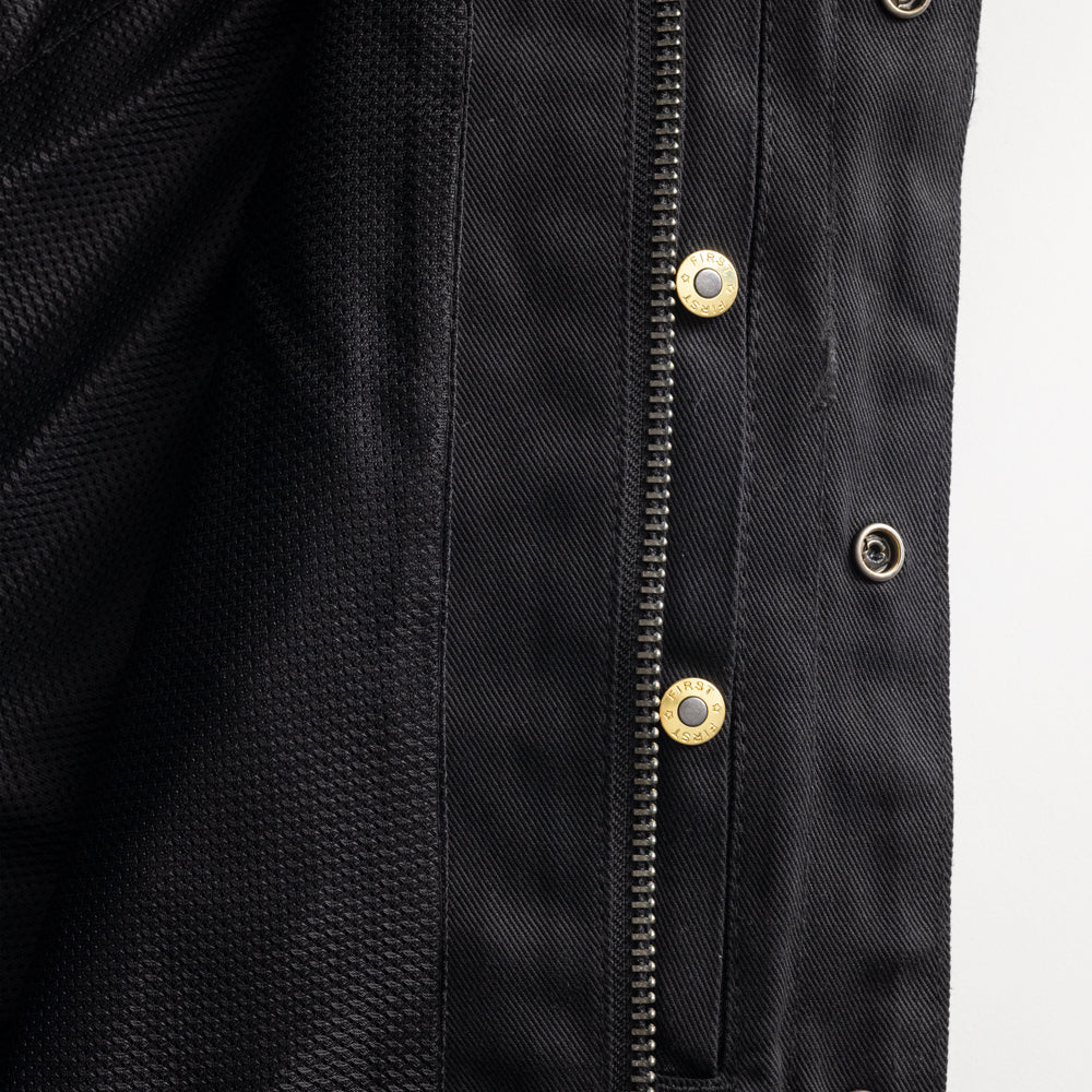Close-up of snaps and zipper on Desperado Men's Twill Motorcycle Jacket, emphasizing hardware details.