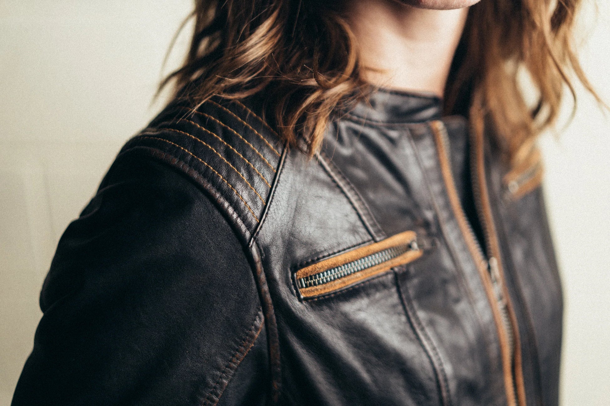 Top view of woman wearing Electra Leather Motorcycle Jacket, emphasizing shoulder design and collar detail.