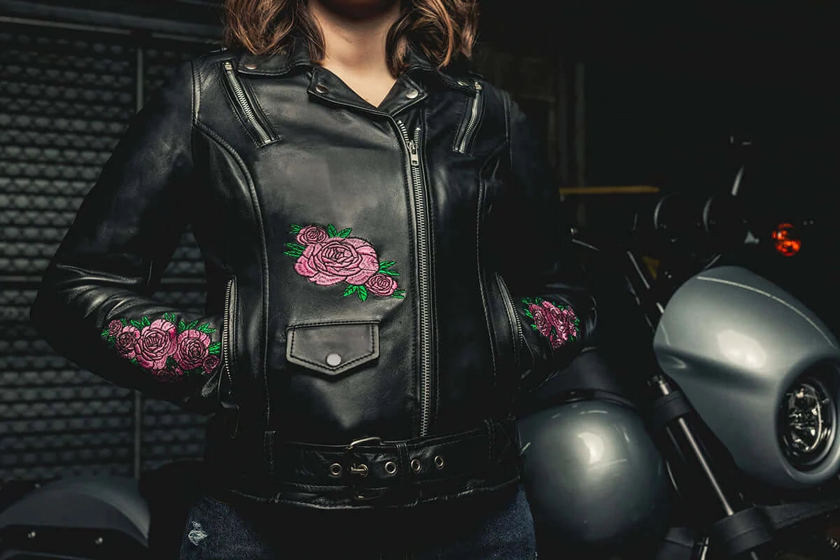 Front view of a woman wearing Bloom Women's Leather Motorcycle Jacket, displaying the fit and style of the jacket on her figure.
