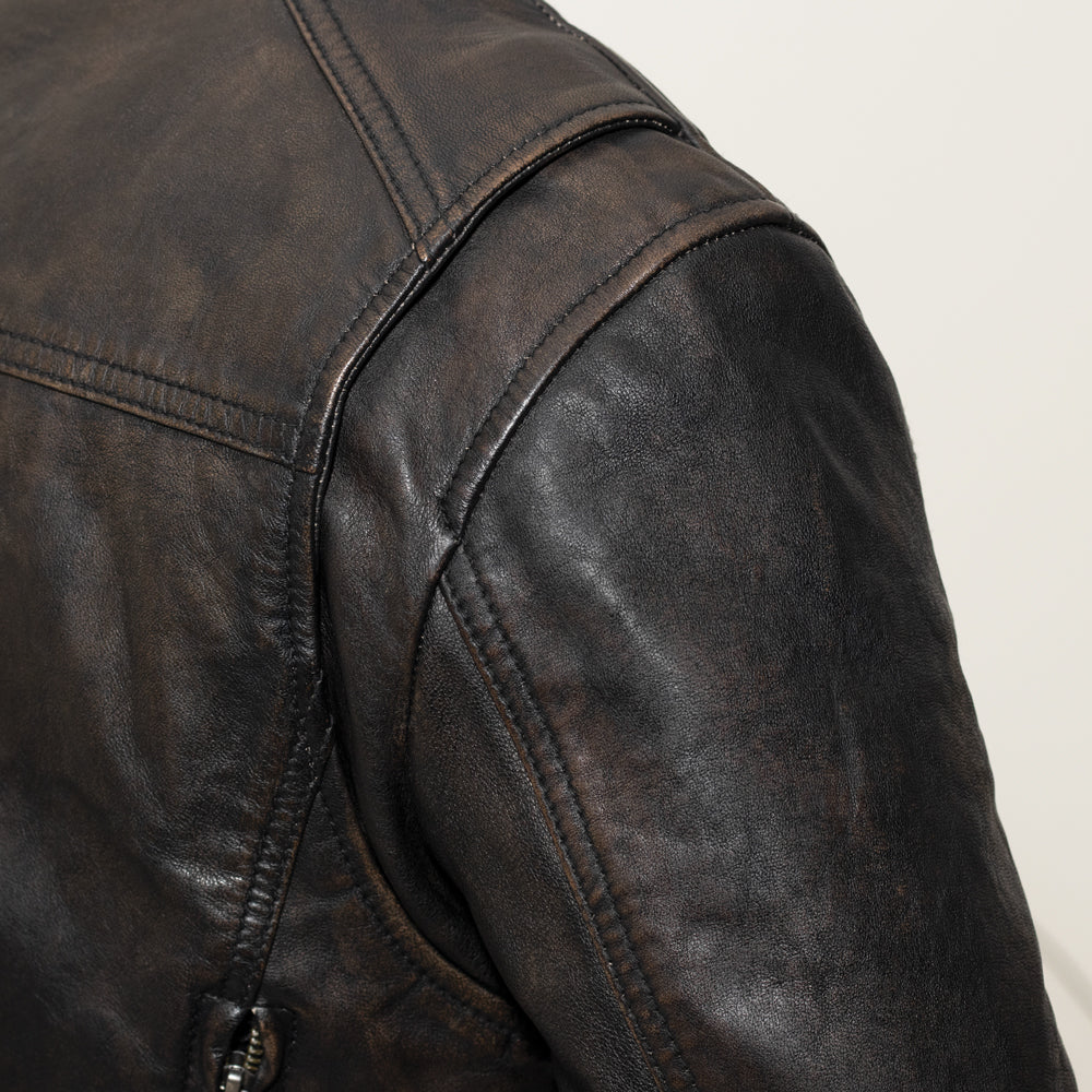 Trickster Motorcycle Jacket: Shoulder View, Vents, Stylish Leather.