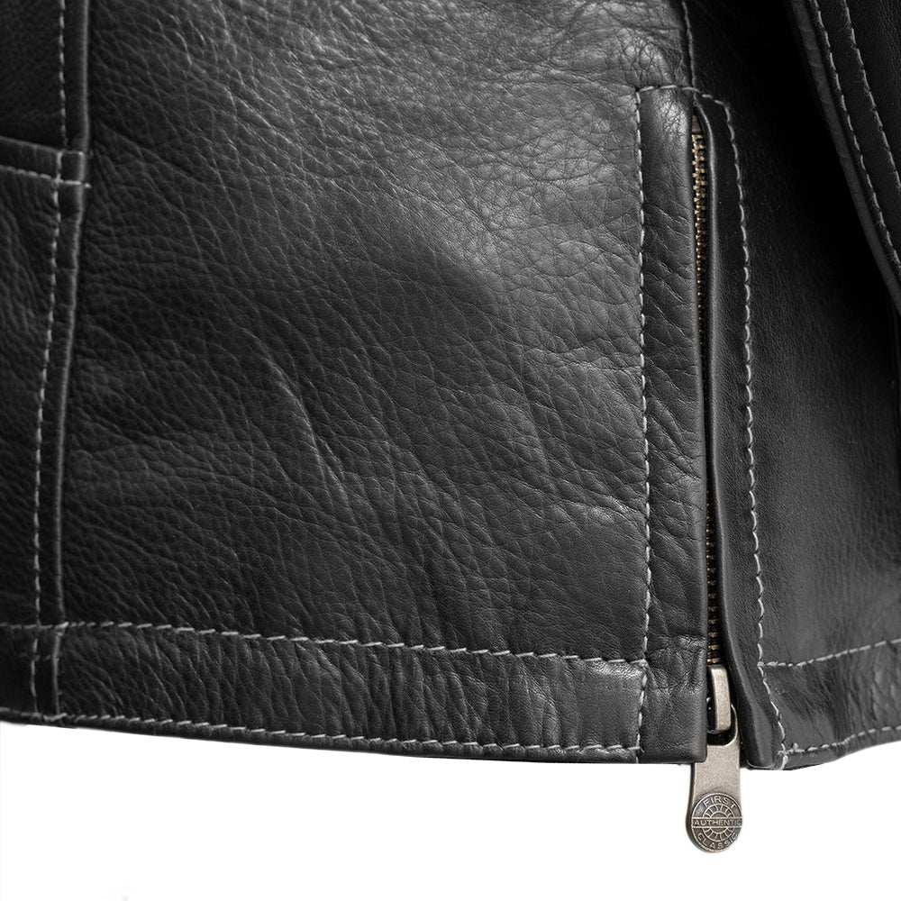  "Close-up photo of The Outlander motorcycle jacket's bottom side, showcasing the zipper detail. Made with durable .8-.9mm Diamond Cowhide leather. Sizes XS-5X. Perfect for cruisers and adventure bikes."