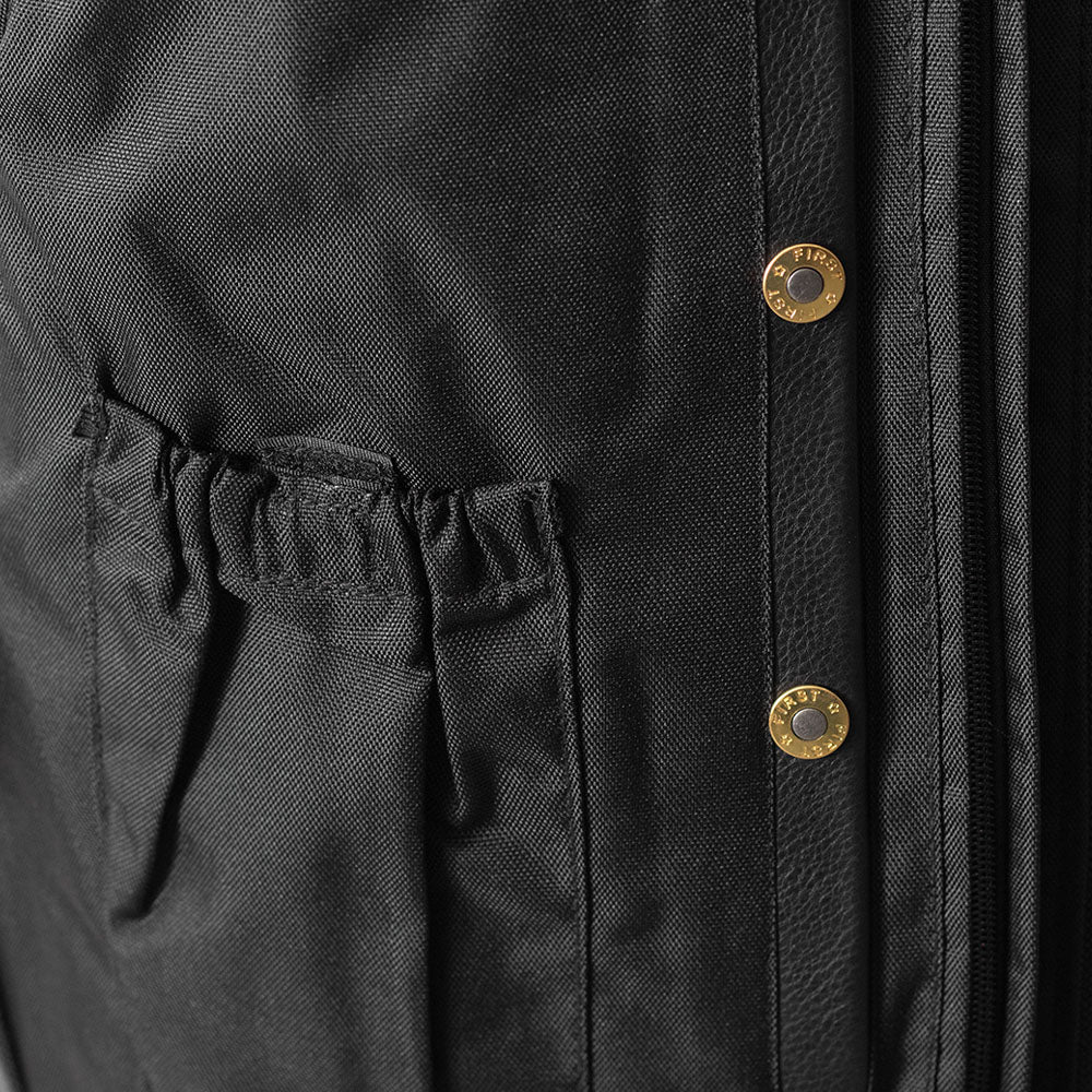  Close-up of zipper and snaps on Club House Men's Leather Motorcycle Vest, highlighting metal hardware details.